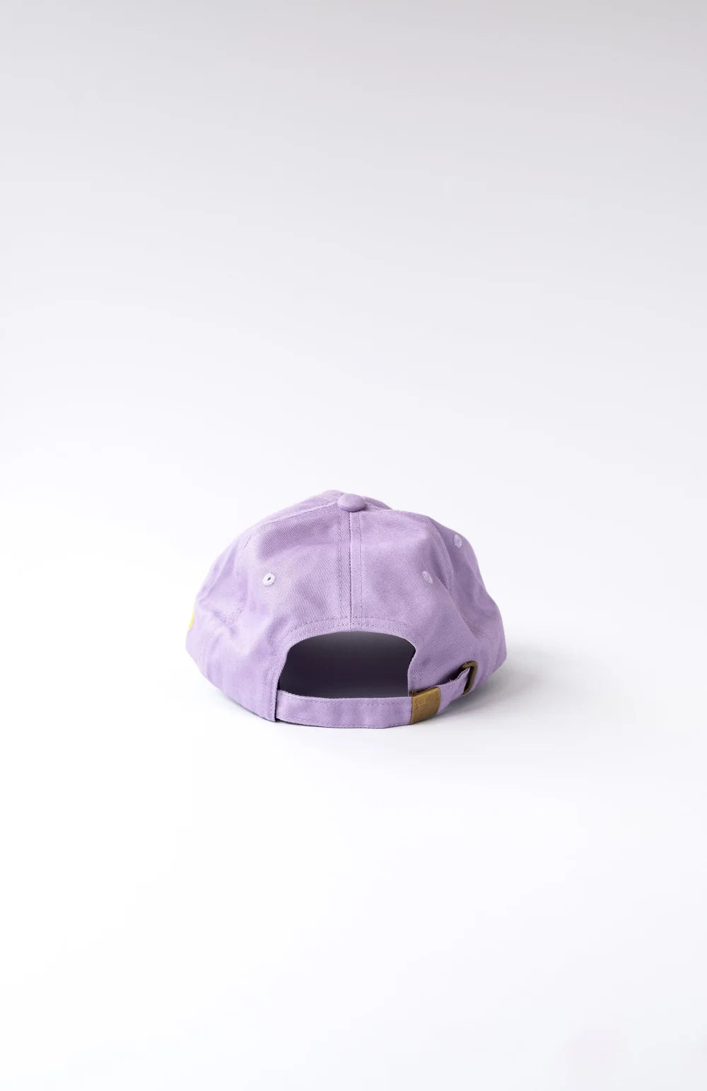 Sportsball unstructured cotton dad hat with adjustable fabric strap and brass buckle