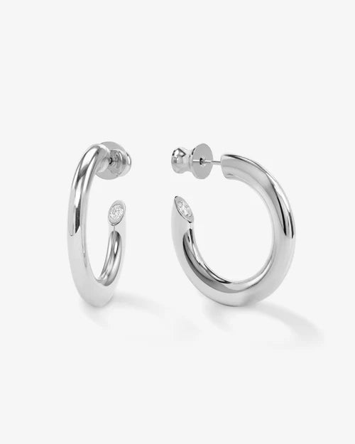 Melinda Maria Beacon hoop earrings with sculpted curve and stone detail 1 inch diameter