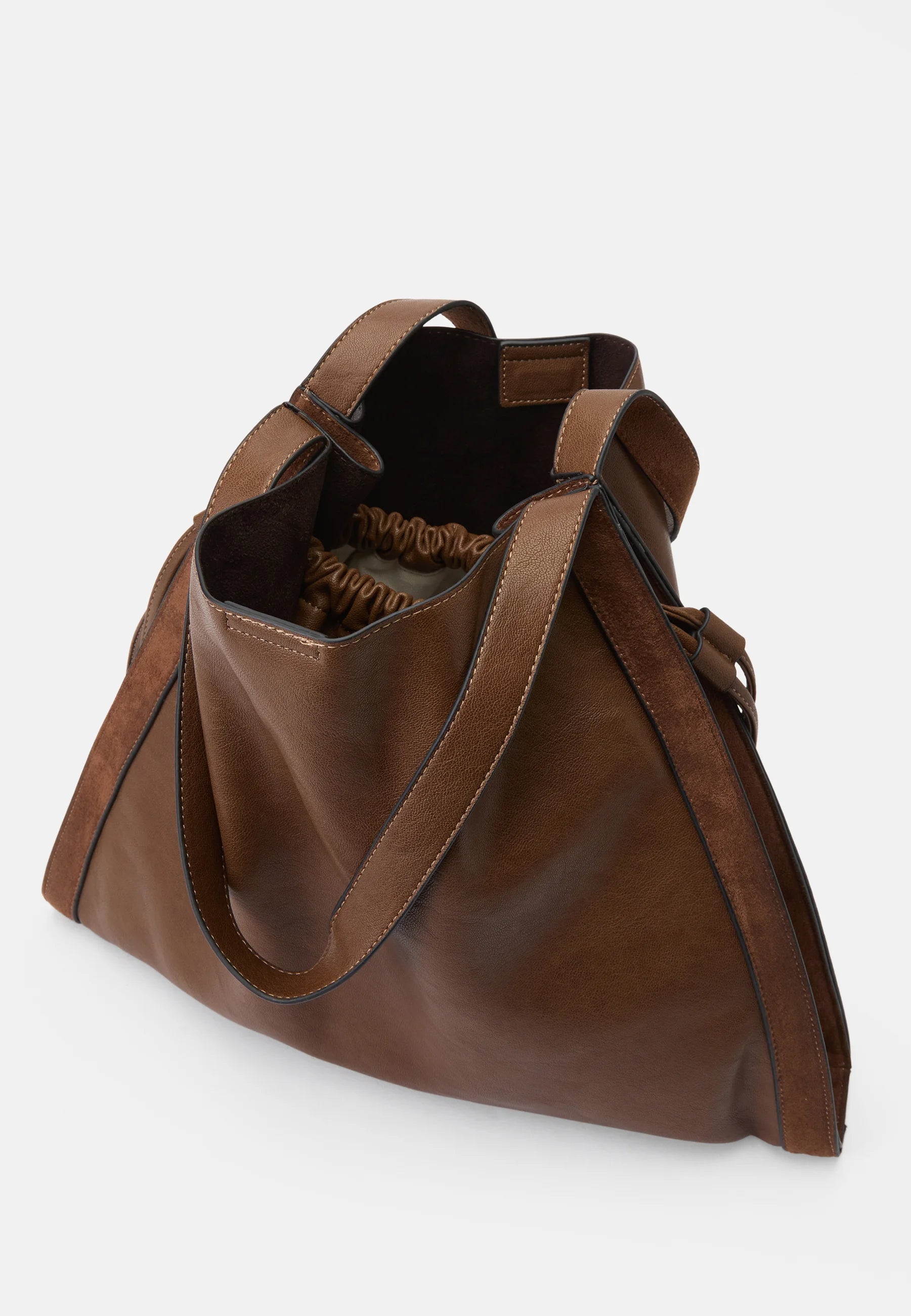 Dolce Vita faux leather shoulder bag with contrasting trims and adjustable side gussets