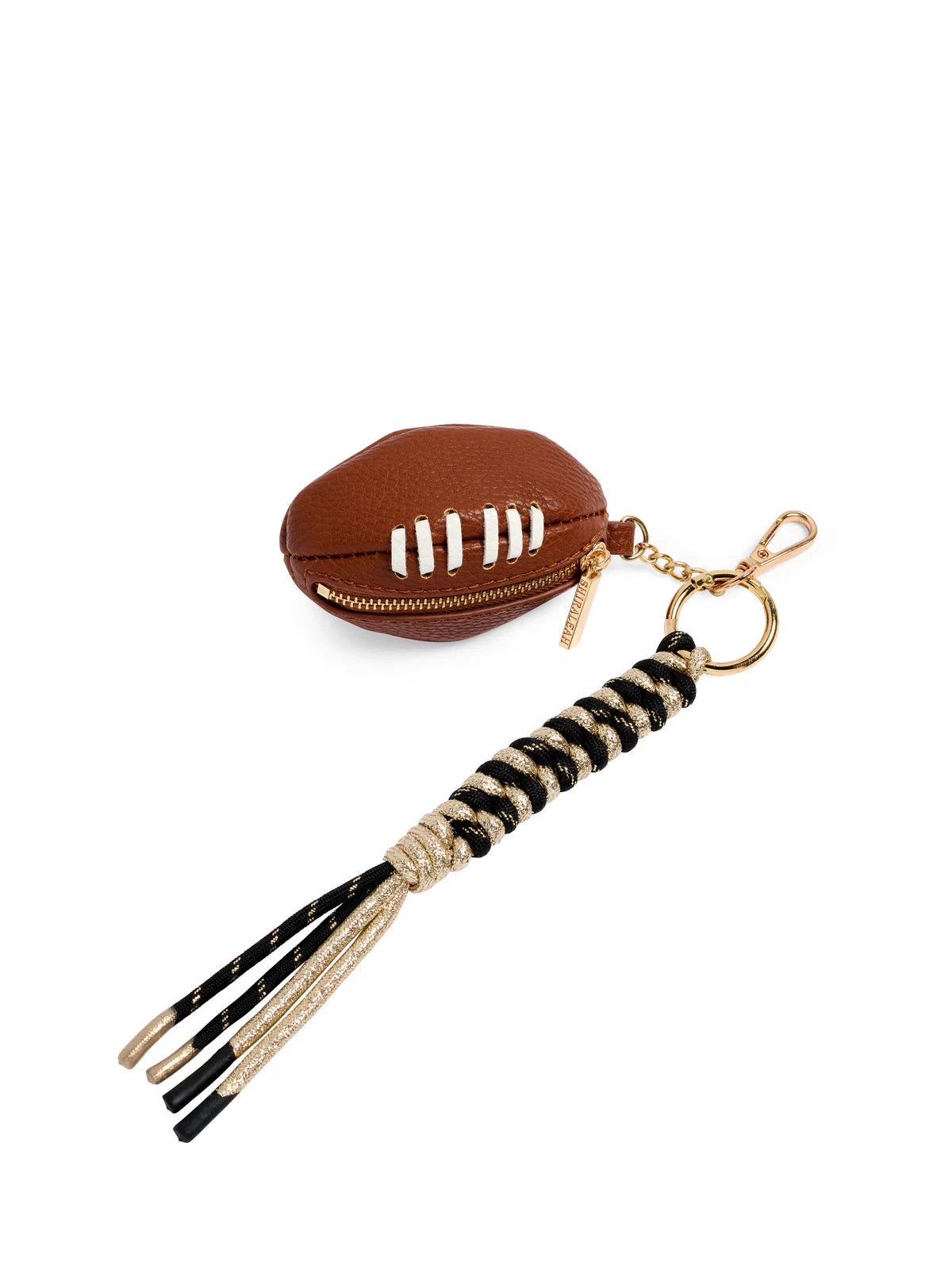 Football-shaped keychain with tassel on a white background