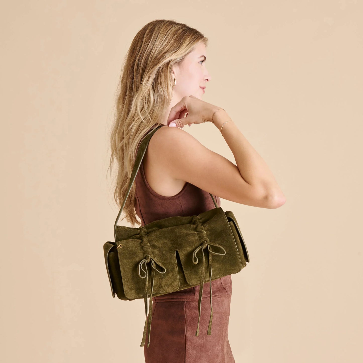 Hudson Shoulder Bag in olive suede with drawstring exterior pockets
