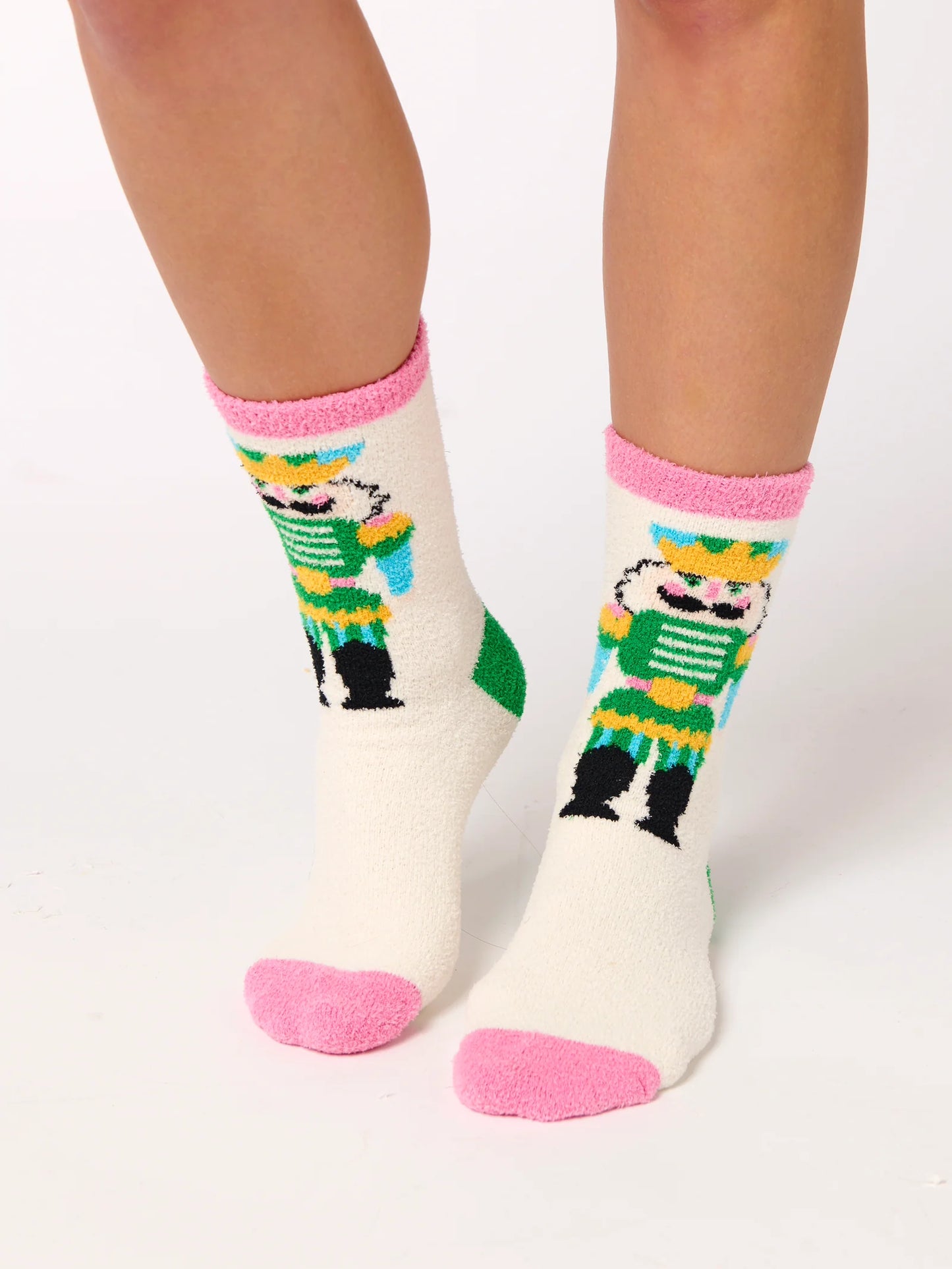 Nutcracker Socks with colorful nutcracker design and pink cuff and toe