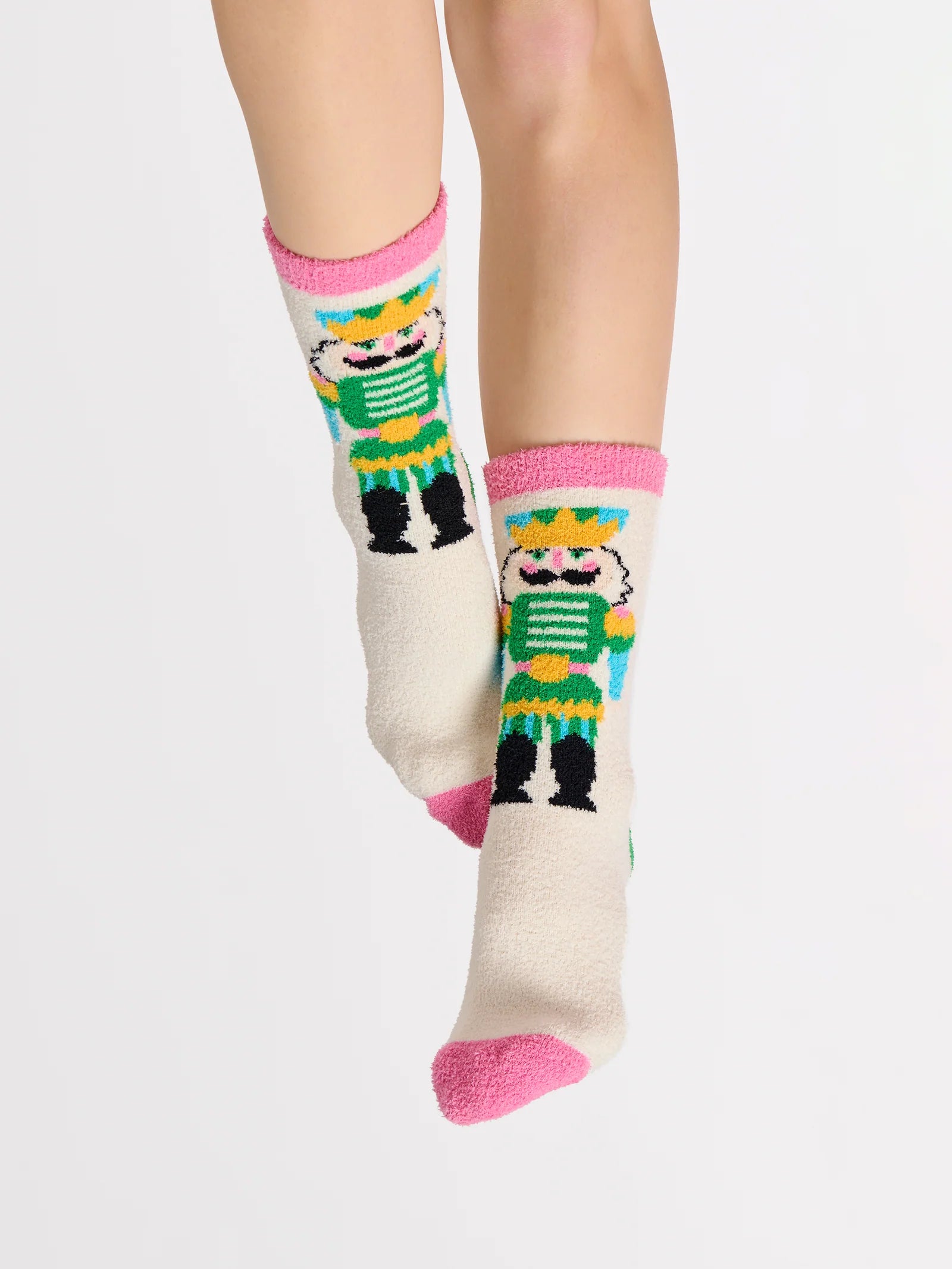 Nutcracker Socks with colorful nutcracker design and pink cuff and toe