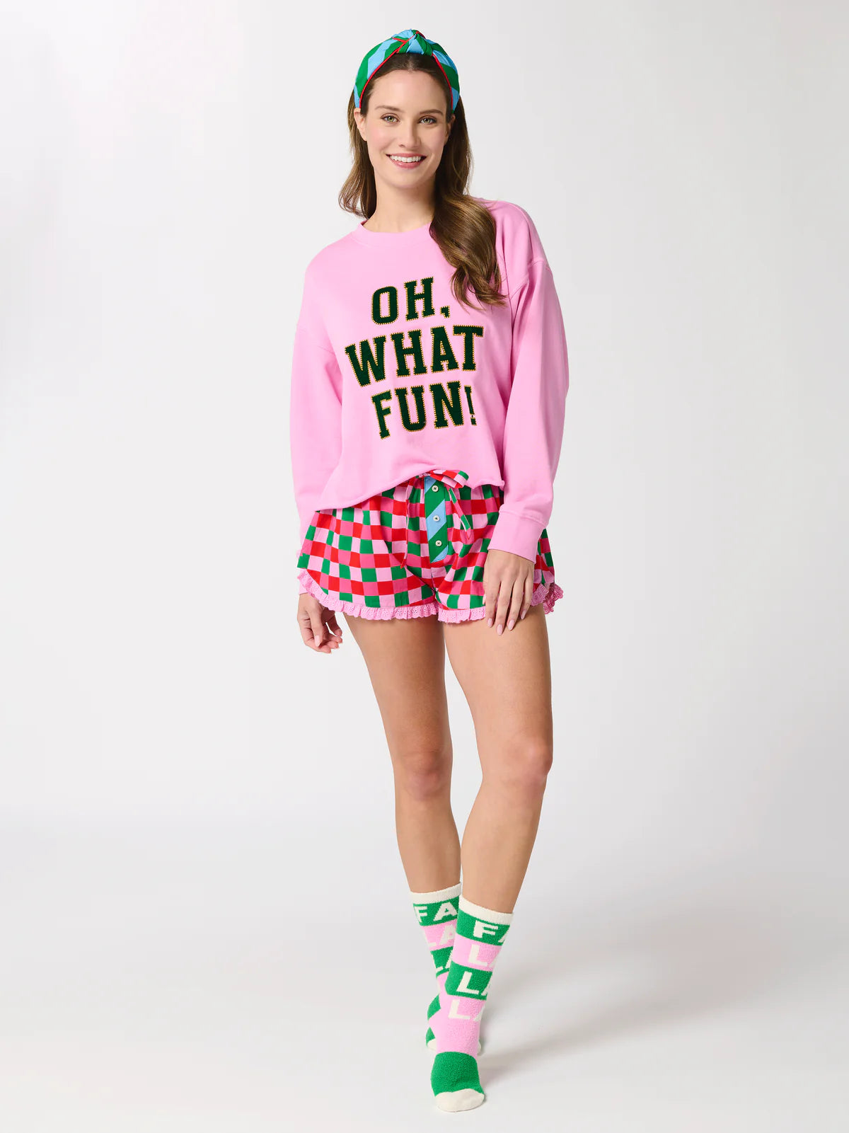 Oh What Fun cropped pink lounge sweatshirt with green varsity lettering and gold embroidery