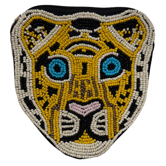 Tiger beaded pouch with bold tiger design pom pom zipper and black cotton background