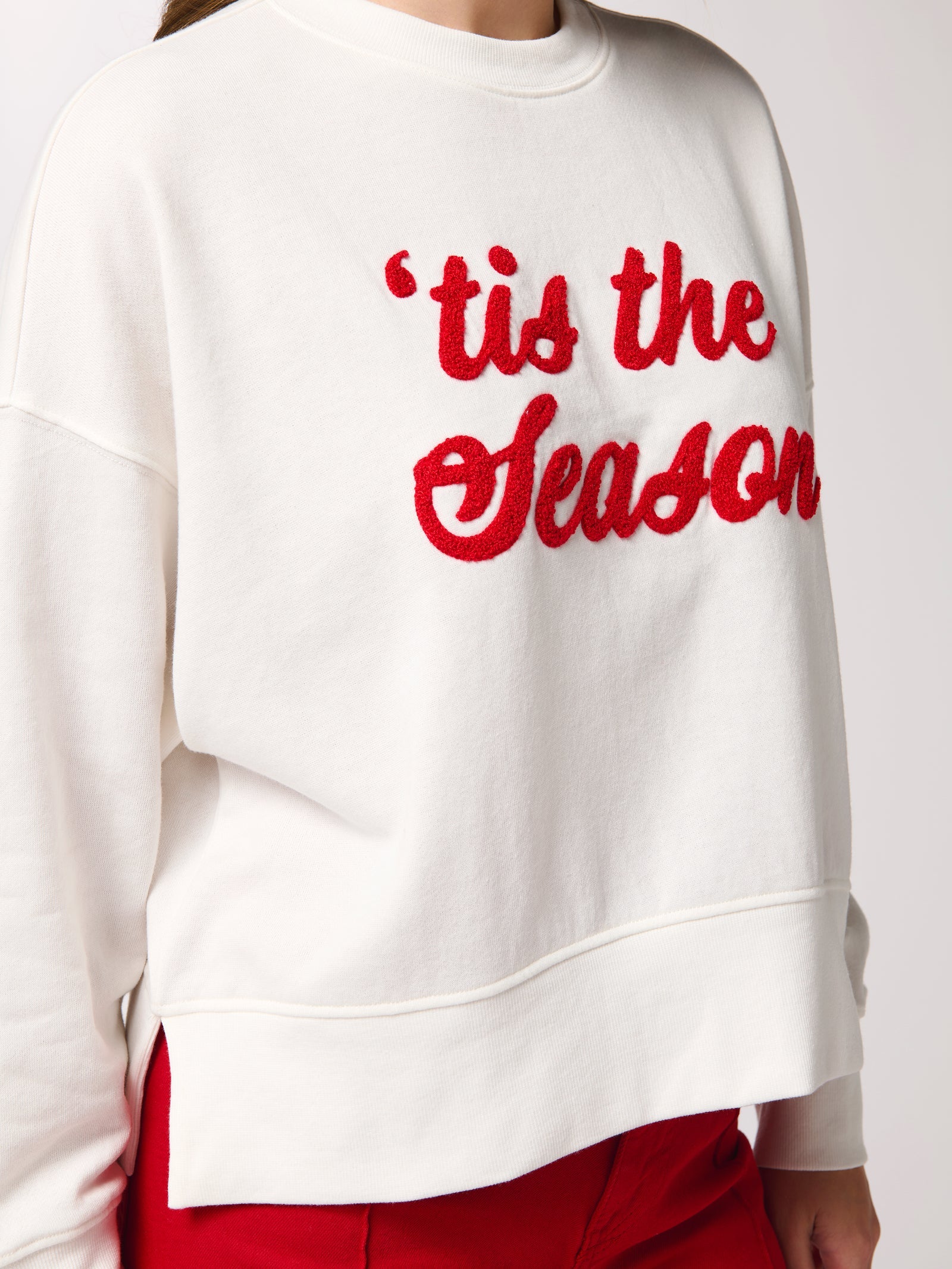 Tis the Season Fa La La relaxed ivory sweatshirt with red chenille lettering and rainbow sleeve print