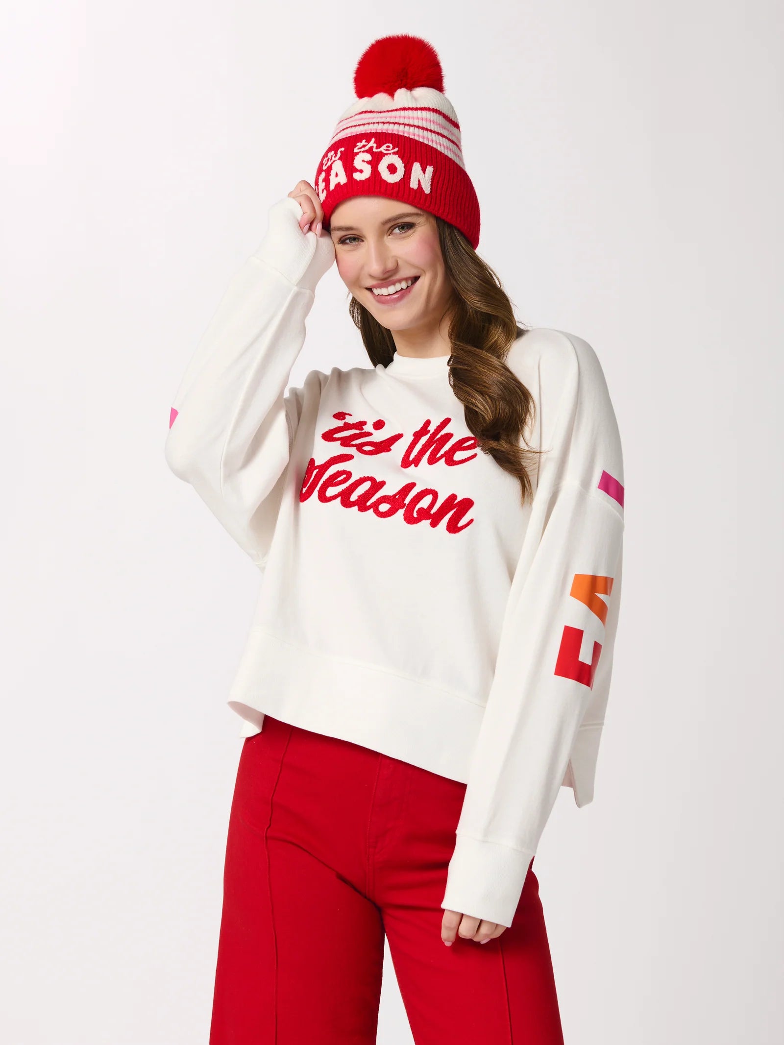 Tis the Season Fa La La relaxed ivory sweatshirt with red chenille lettering and rainbow sleeve print